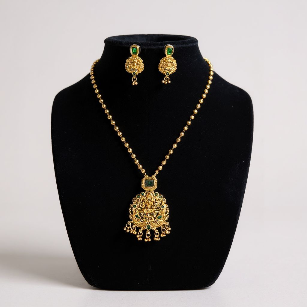 Lakshmi pendant necklace set with golden beads