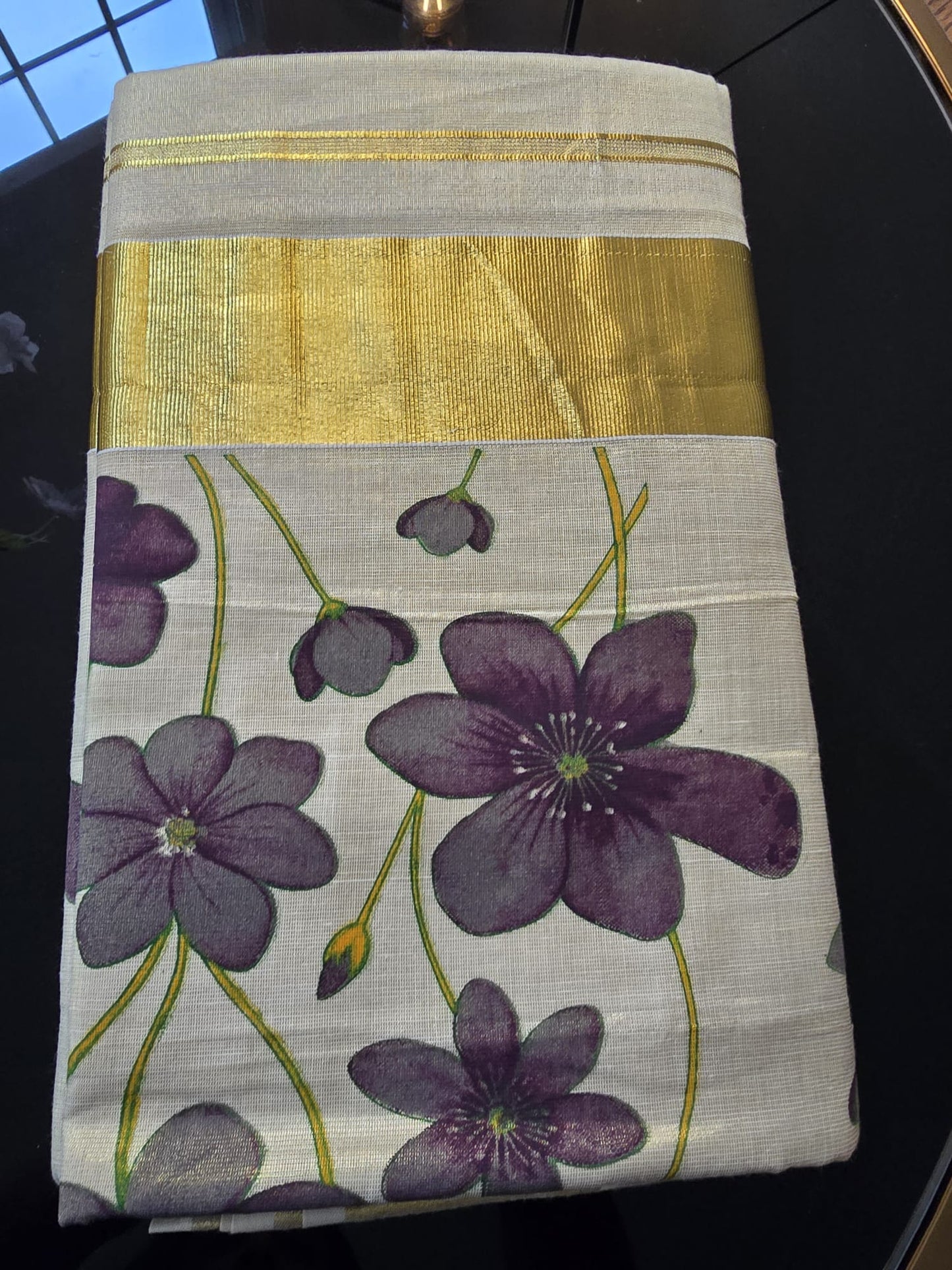 Kerala Tissue Saree with Floral Print