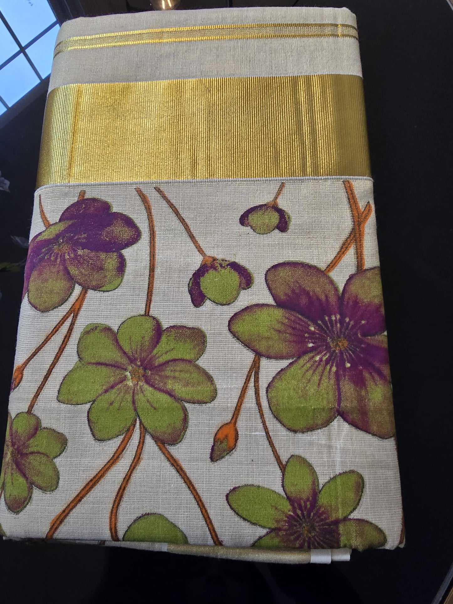 Kerala Tissue Saree with Floral Print