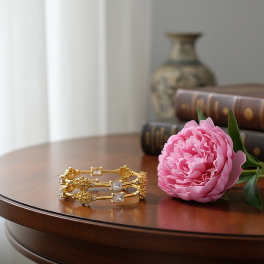Gold Plated Lakshmi Bangle with white stones set of 2