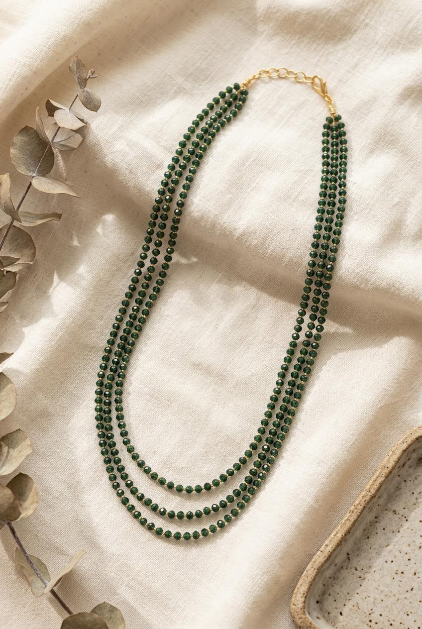 Three-strand bead and gold chain necklace