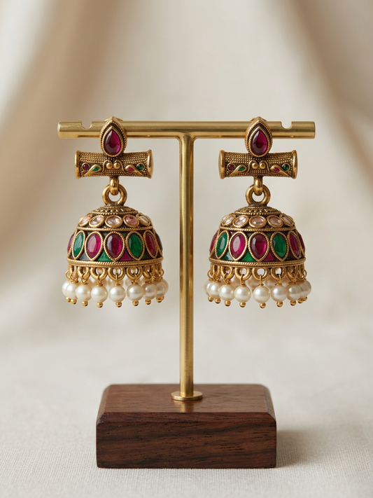 Aarohi Antique Gold Kemp Stone Jhumkas with Pearl Drops